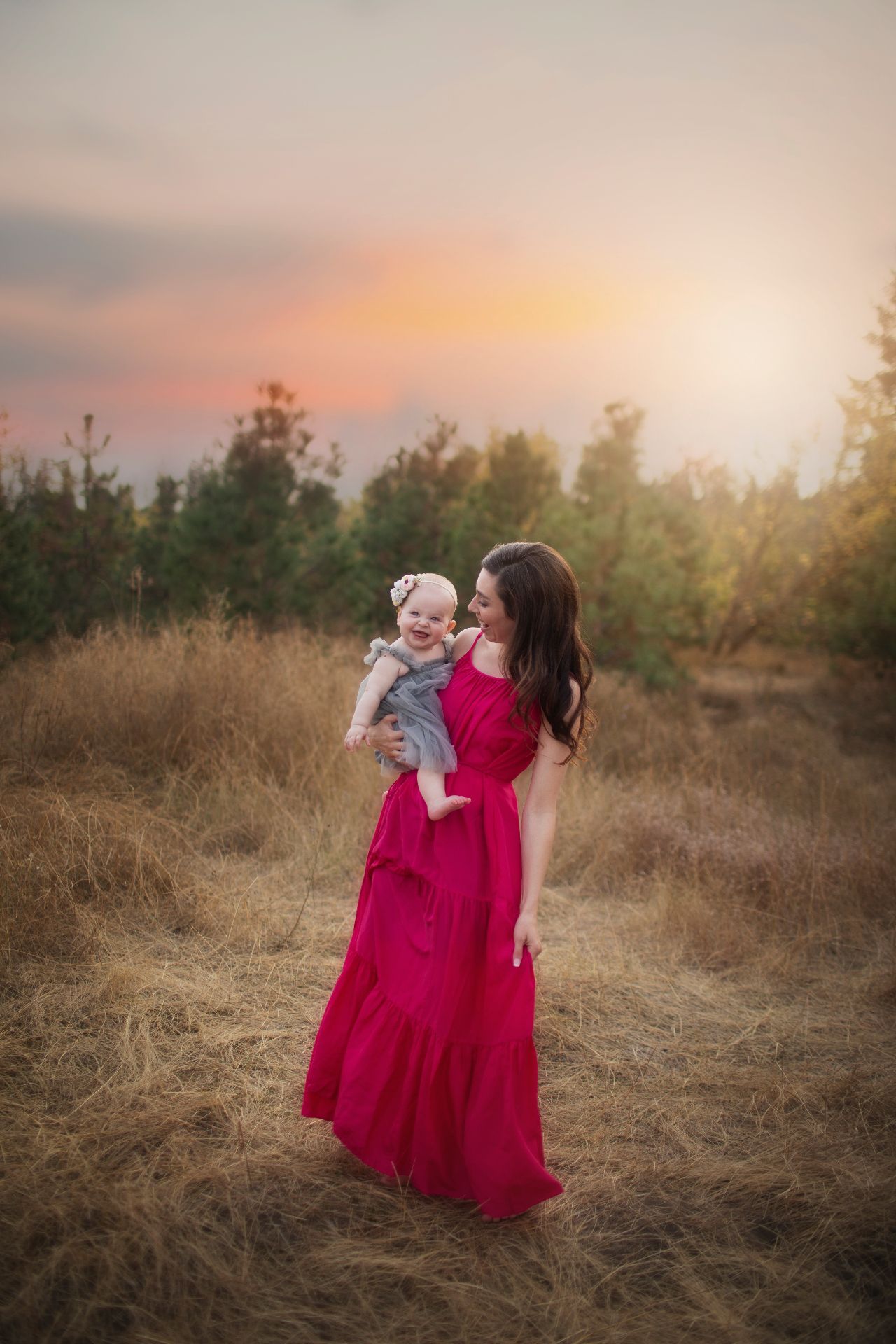 Mother and daughter at sunset